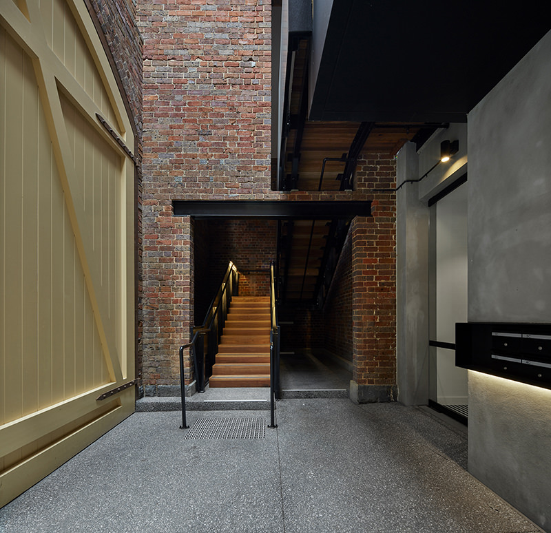 Interior view of the massive entry door at the Yorkshire Brewery Apartments in Collingwood